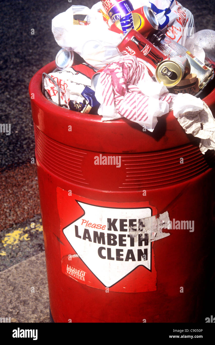 A bin overflowing with rubbish in South London's Lambeth , England Stock Photo Alamy