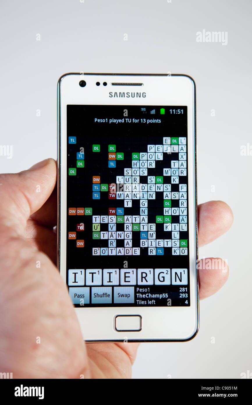 Playing Wordfeud  on Samsung Galaxy S II I9100  smartphone Stock Photo