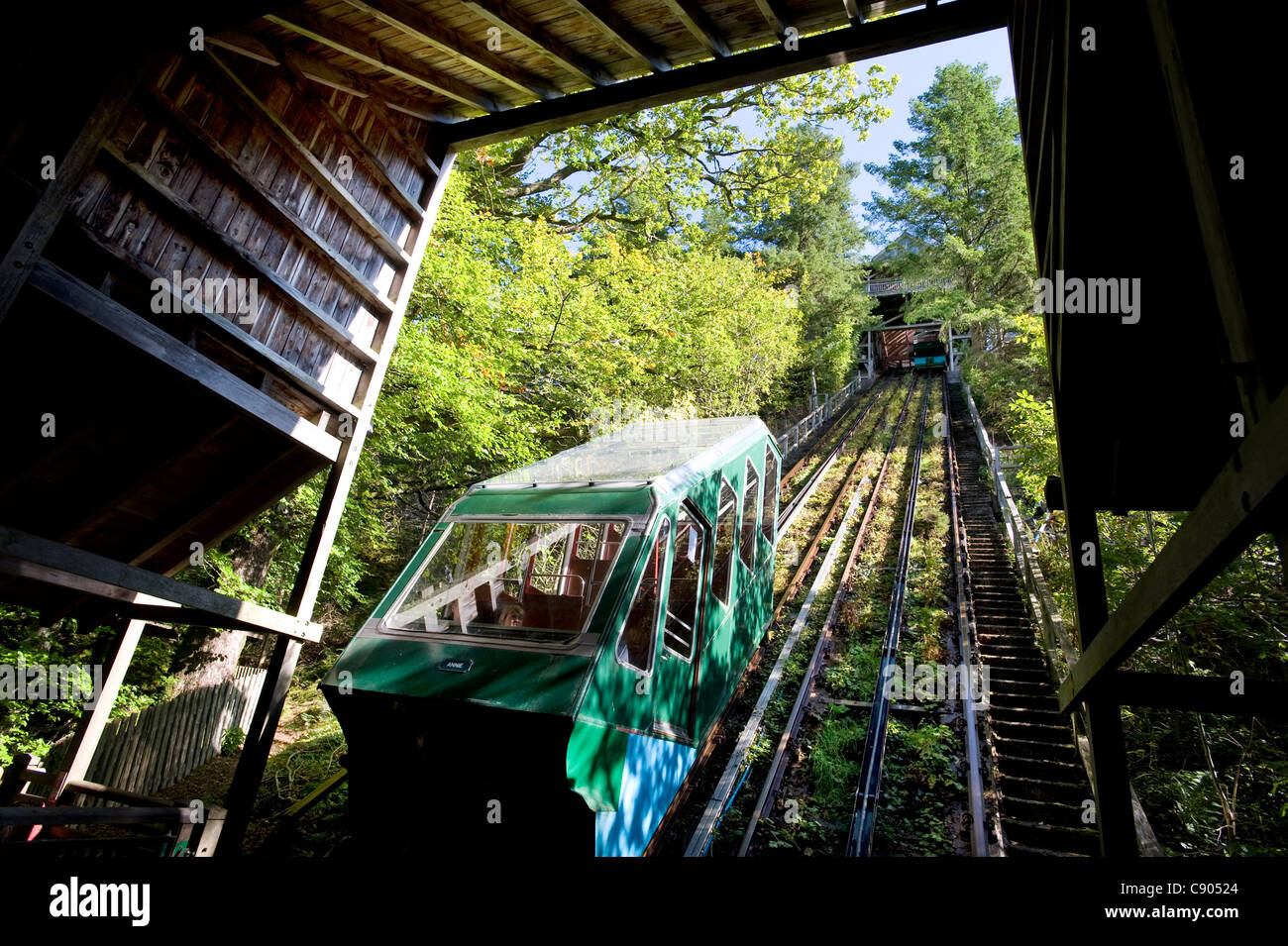 A car on the water- balanced Funicular cliff railway, one of the steepest cliff railways in the world, with a gradient of 35 degrees at The Centre for Alternative Technology, or CAT, in Machynlleth, Powys, North Wales, UK. Stock Photo