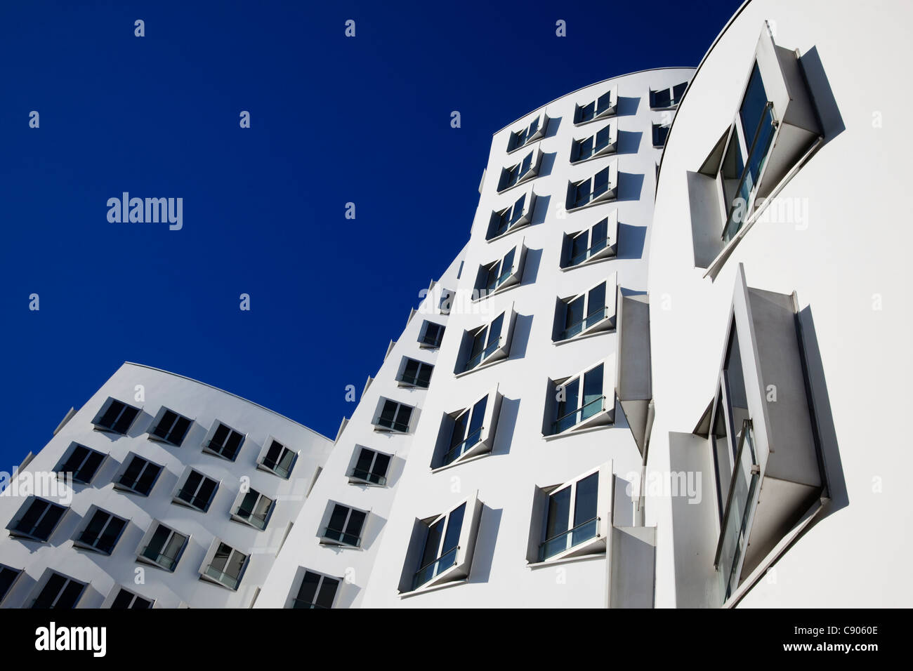 Neuer Zollhof, building designed by architect Frank O. Gehry, Medienhafen, Düsseldorf, North Rhine-Westphalia, Germany, Europe Stock Photo