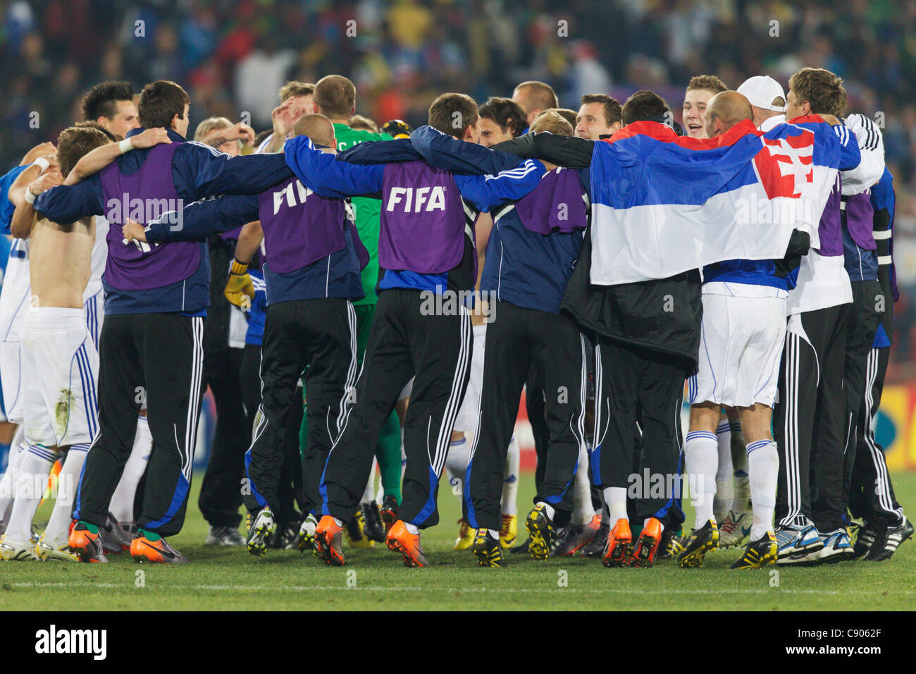 Slovakia players celebrate after defeating Italy in a FIFA World Cup Group F match at Ellis Park Stadium on June 24, 2010. Stock Photo