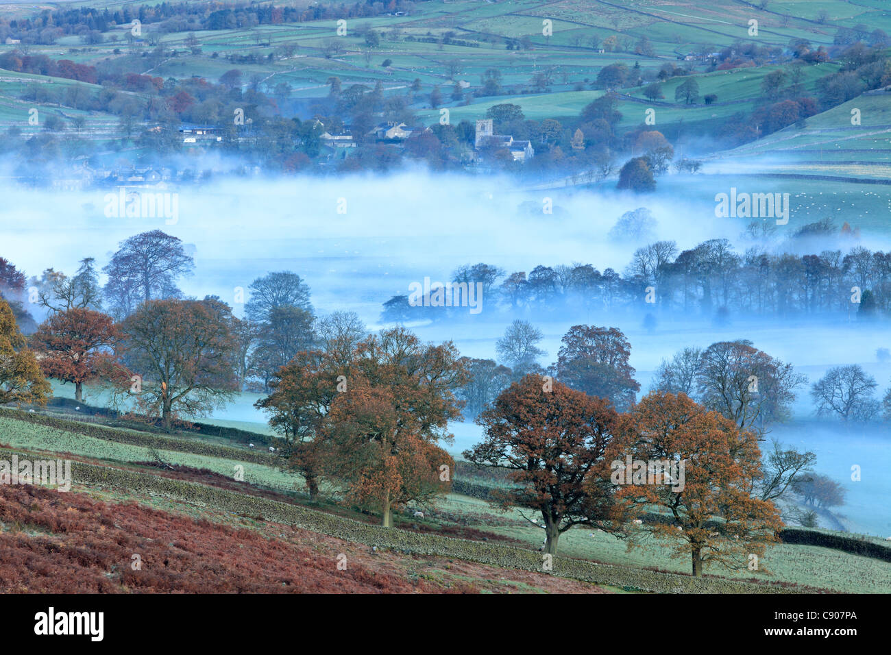 Early morning autumn light over Burnsall in Wharfedale, Yorkshire Stock Photo