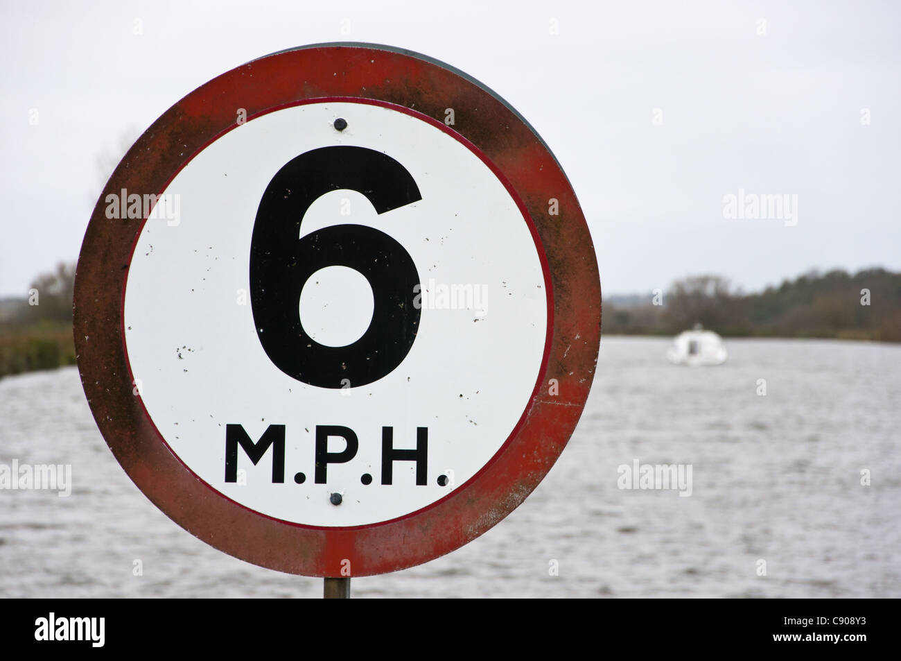 6 MPH speed limit sign river Yare Norfolk Broads Stock Photo