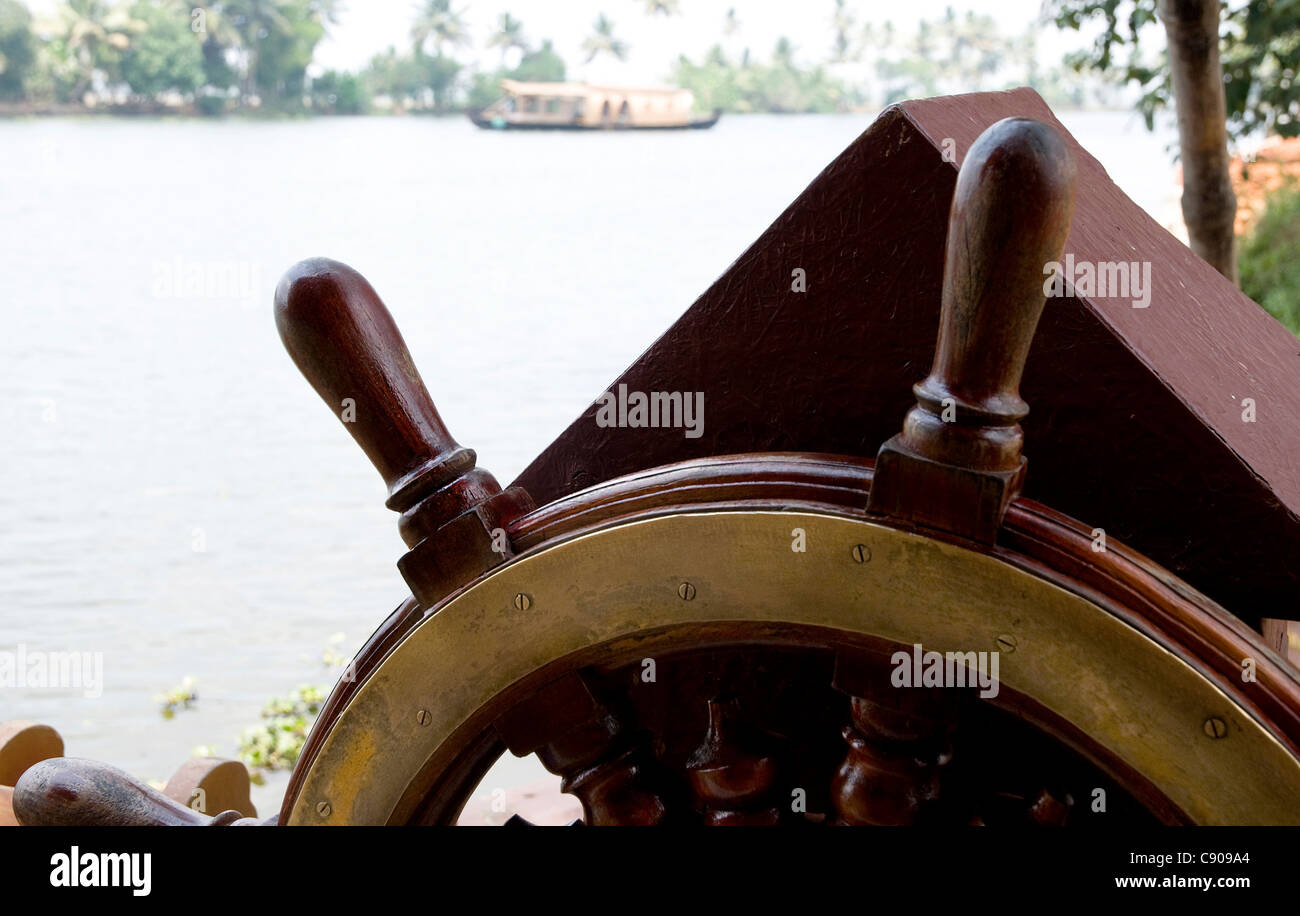 Close-up of the forward steering wheel of a Kettuvallam,houseboat in the Kerala Backwaters at  Lake Vembanad, Kerala, India Stock Photo