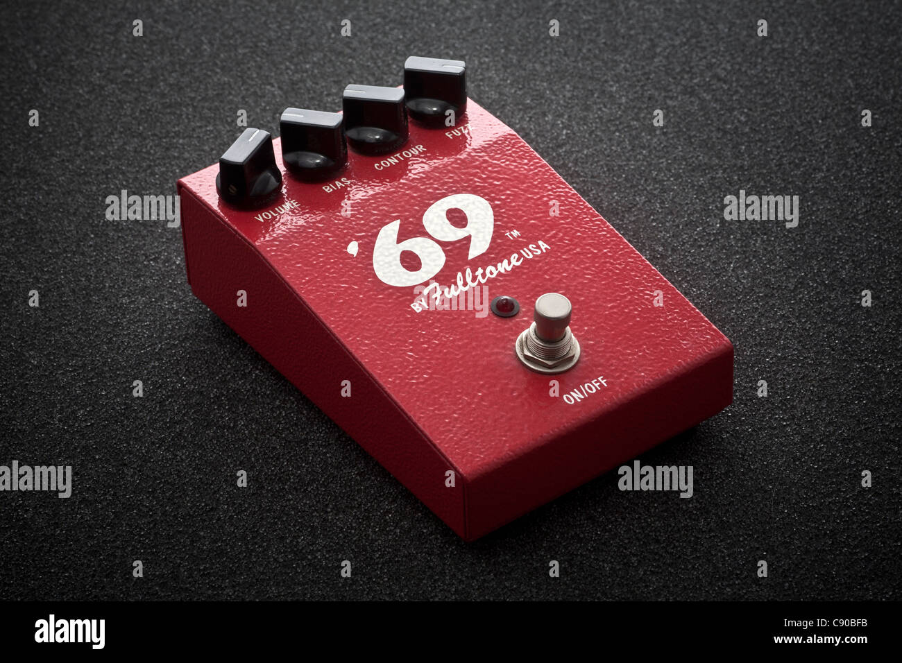 A FULLTONE 69 effect pedal photographed in the studio. It is an effect unit designed to be turned on and off with the feet. Stock Photo