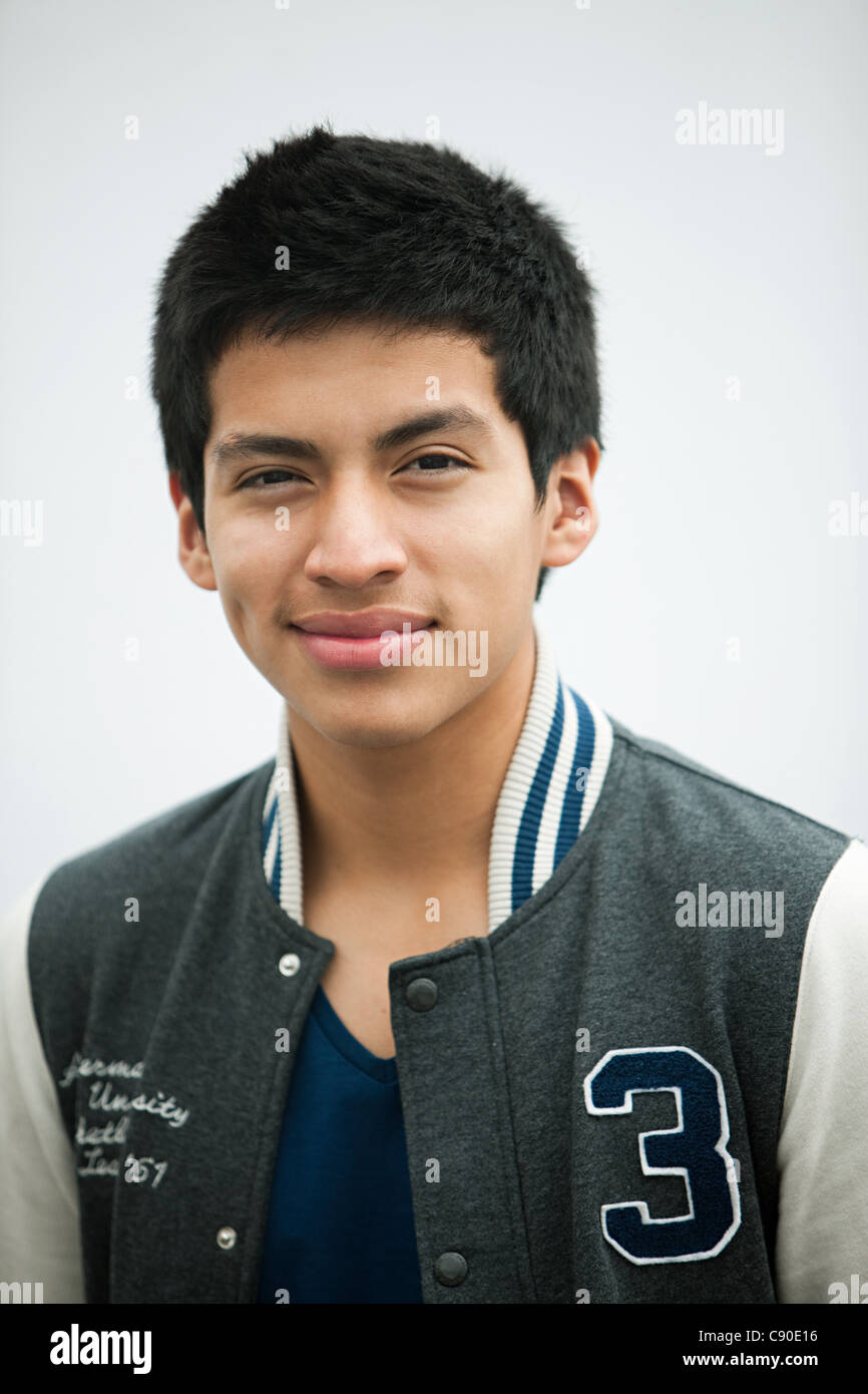 Young man wearing baseball jacket, portrait Stock Photo