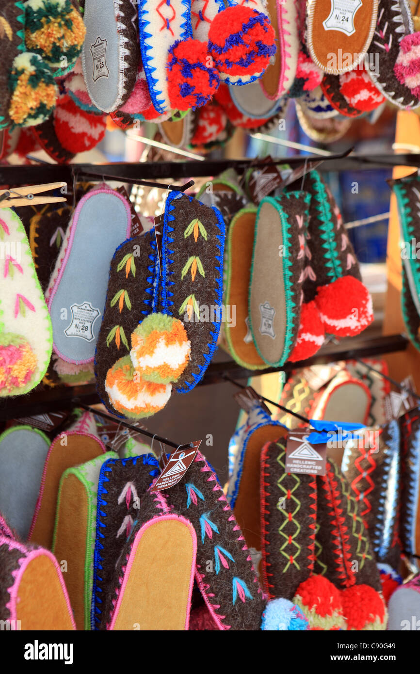 Colourful slippers with pom poms for sale on a stall in Greece Stock Photo  - Alamy