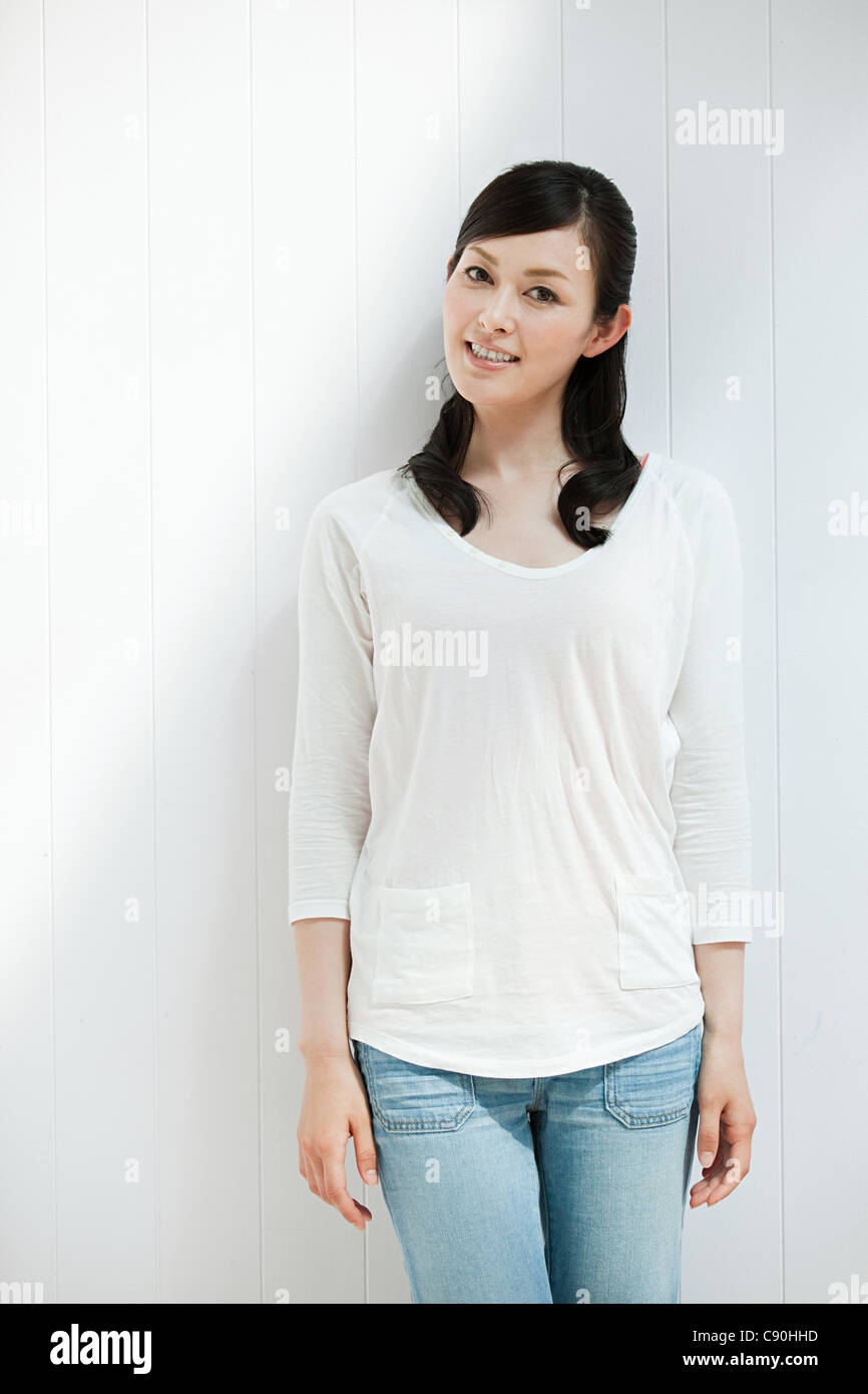 Woman wearing white top, portrait Stock Photo
