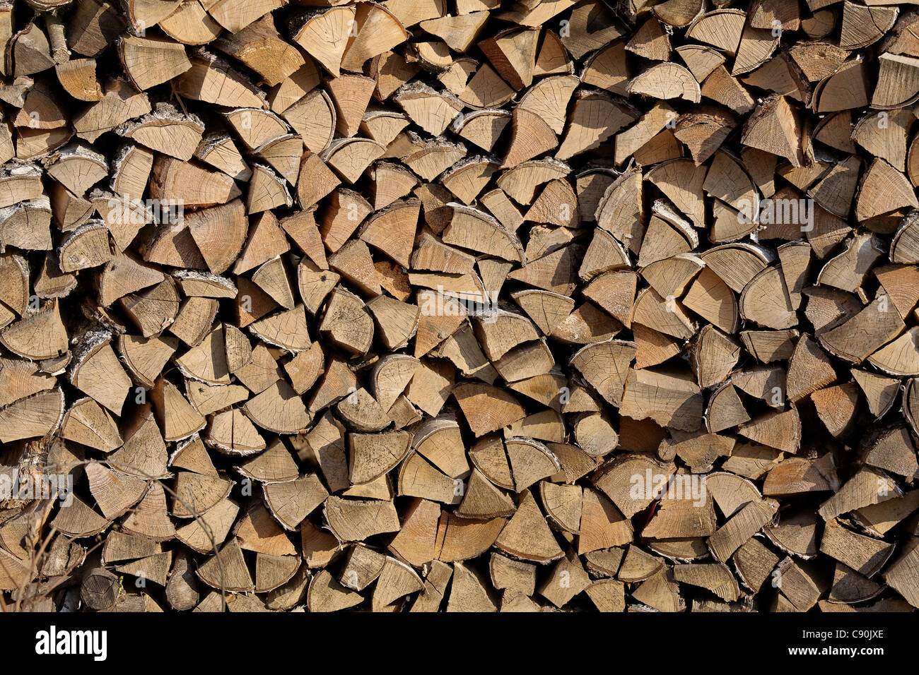 Birch firewood stacked outside. Horizontal composition. Stock Photo