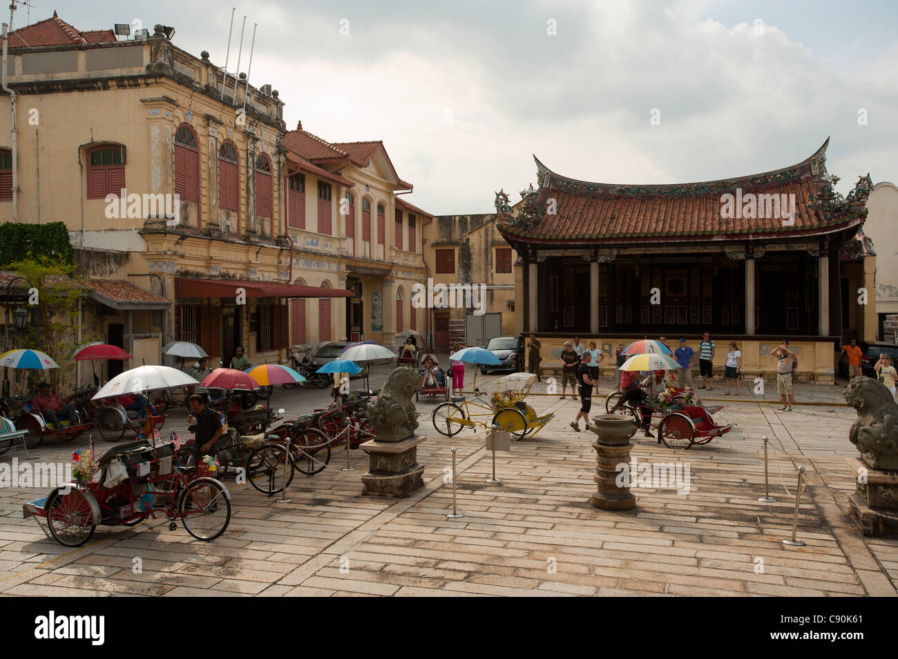 Trishaws on square in front of Kongsi Clan Temple, Georgetown, Penang, Malaysia, Asia Stock Photo