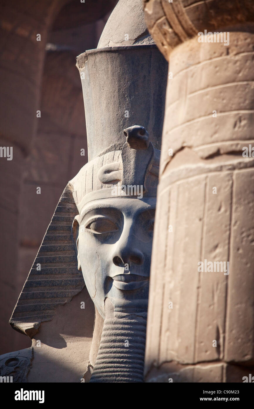Colossal statue of Ramesses II in the entrance area of Luxor Temple, Luxor, Egypt, Africa Stock Photo