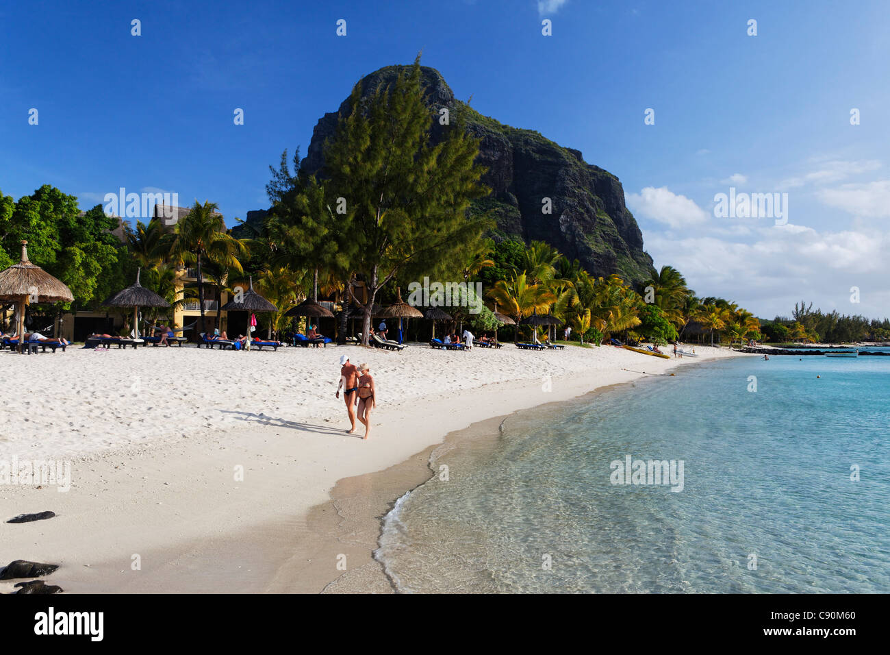 Beach and Le Morne Brabant mountain in the sunlight, Beachcomber Hotel Paradis &amp;amp; Golf Club, Mauritius, Africa Stock Photo