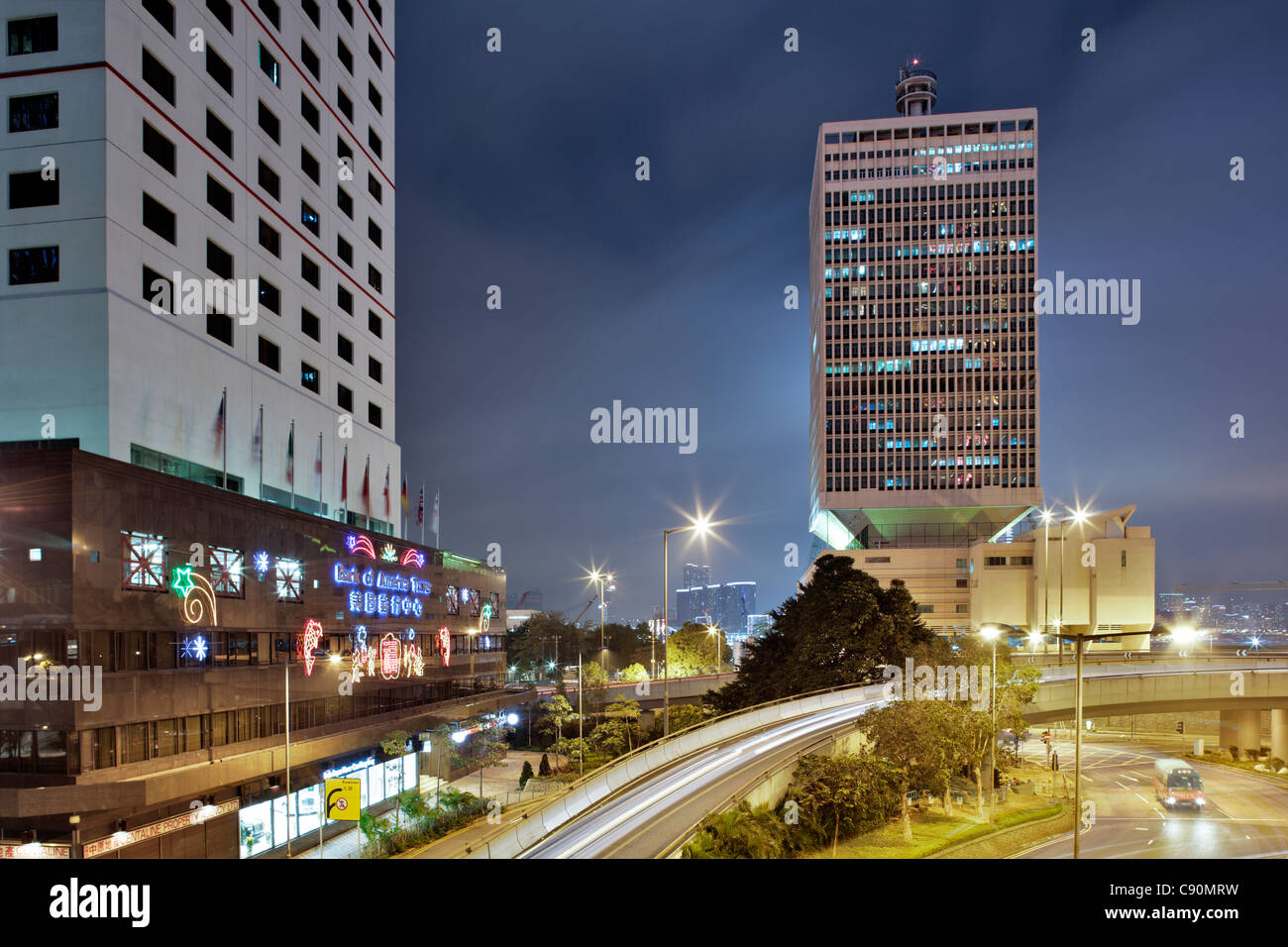 Bank of America Tower, Chinese People's Liberation Army Forces Hong Kong Building at night, Hong Kong, China Stock Photo