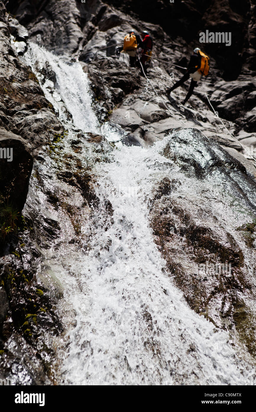People canyoning at Canyon du Fleur Jaune bei Cilaos, La Reunion, Indian Ocean Stock Photo