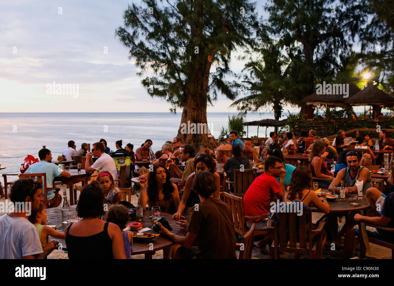 People in a beach bar in the evening, Saint Gilles, La Reunion, Indian
