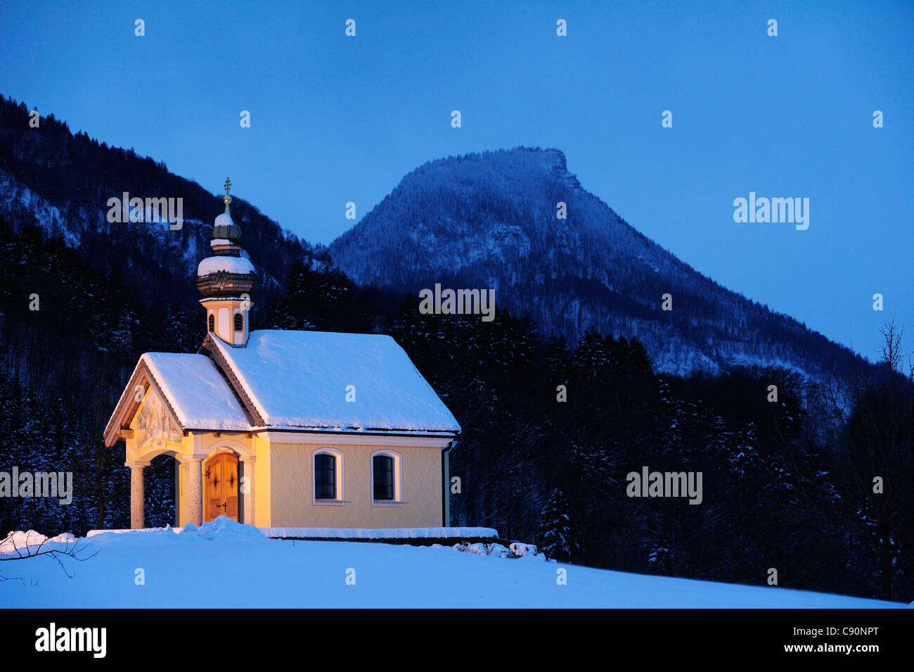 Snow covered chapel, Heuberg in background, Inntal, Chiemgau, Upper Bavaria, Bavaria, Germany, Europe Stock Photo