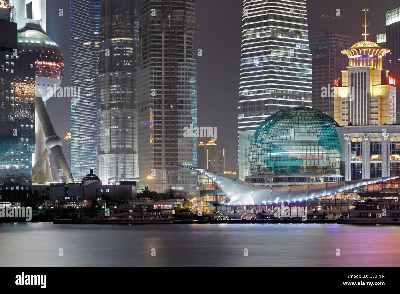 Oriental Pearl Tower and Shanghai International Convention Center at night, Huangpu Riverside, Pudong, Shanghai, China Stock Photo