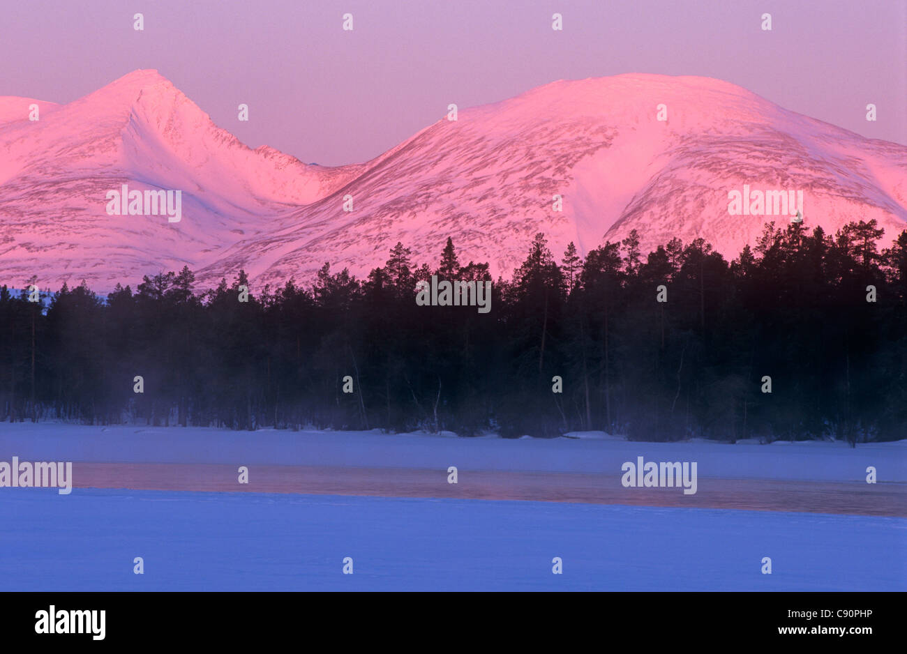 Mount Rondane Mount Rendalssolen is in the Rondane mountain range overlooking a lake ...
