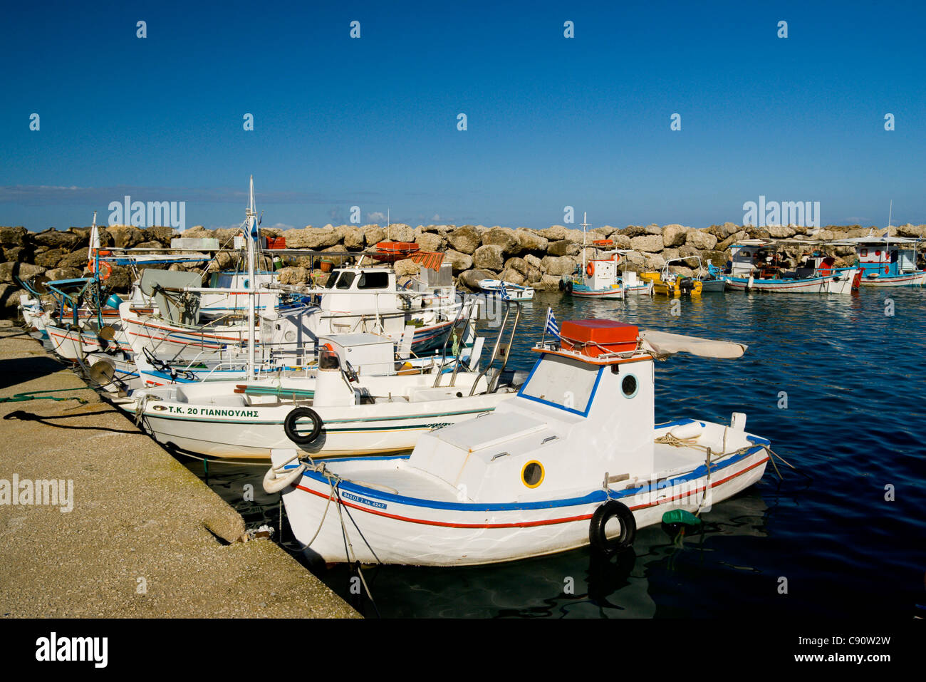 fishing boats moored in new harbour, san stefanos, north west, corfu, ionian islands, greece. Stock Photo