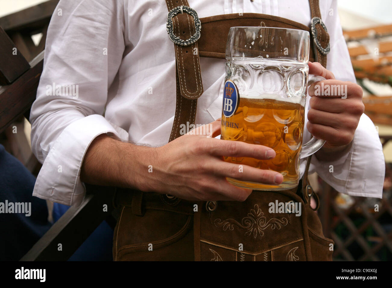 Traditional one litre beer mass at the Oktoberfest Beer Festival in