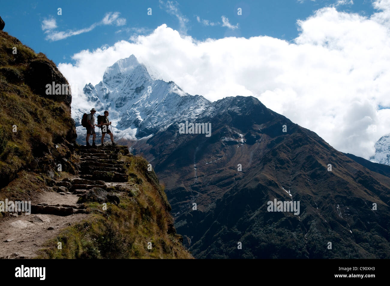 Thamserku is a mountain peak east of Namche Bazaar on the route from Kathmandu through the Solu Khumbu region to Everest Base Stock Photo