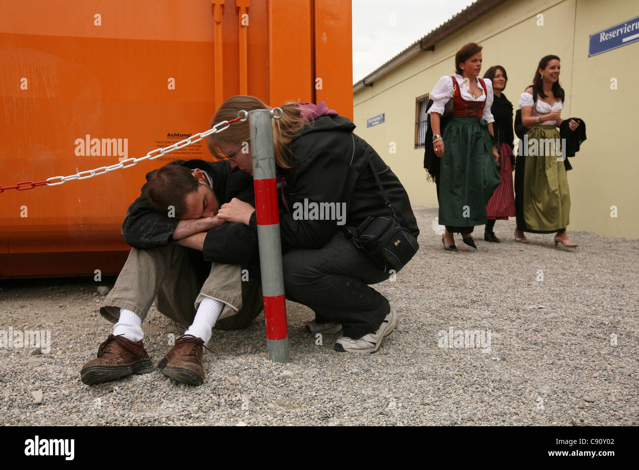 Over drunken visitor at the Oktoberfest Beer Festival in Munich, Germany. Stock Photo