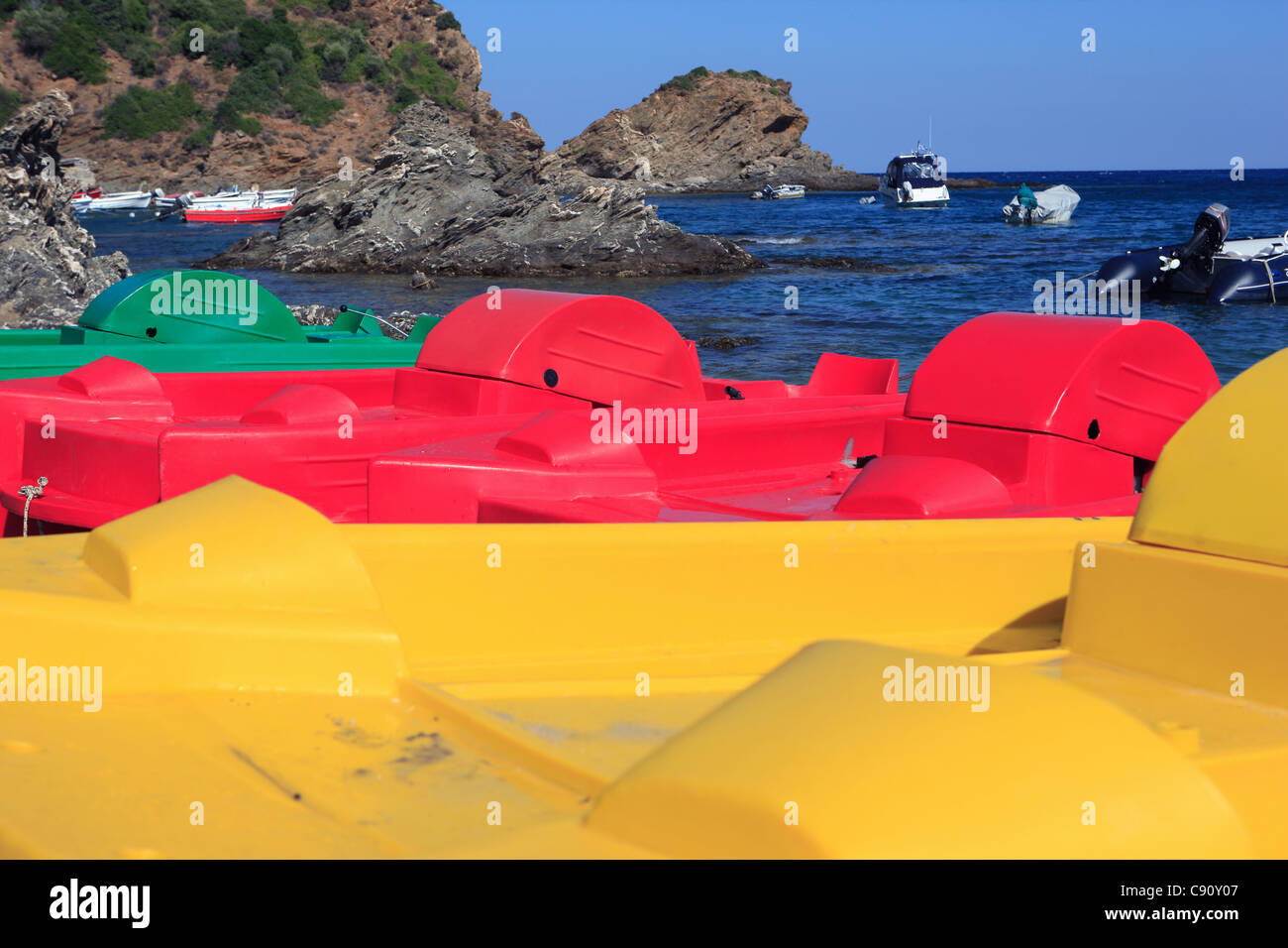 Coloured pedalos on Kalamos beach on Evia Greece Stock Photo