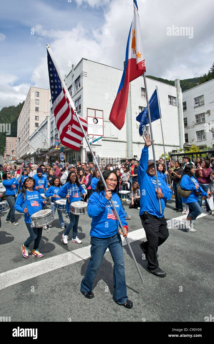 Filipinos marching on the 4th July parade. Juneau. Alaska. USA Stock Photo