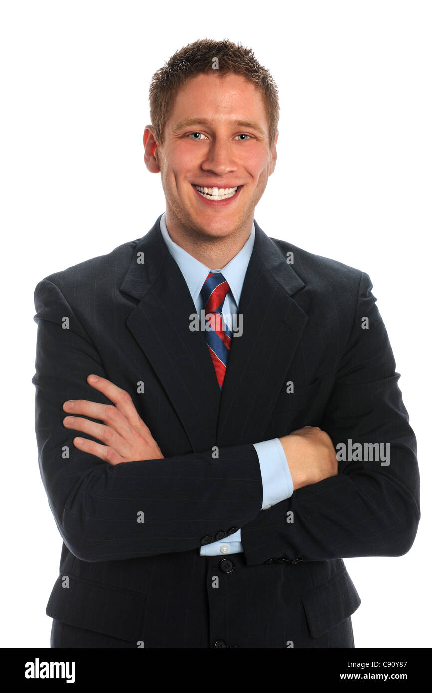 Portrait of young businessman with arms crossed isolated over white ...