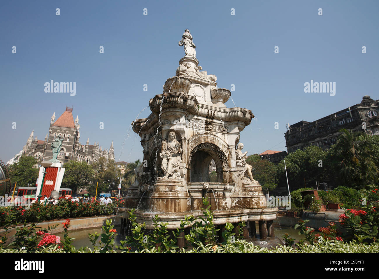 Flora Fountain is a stone fountain in Fort business district built in 1864. The fountain depicts the Roman goddess Flora. It is Stock Photo