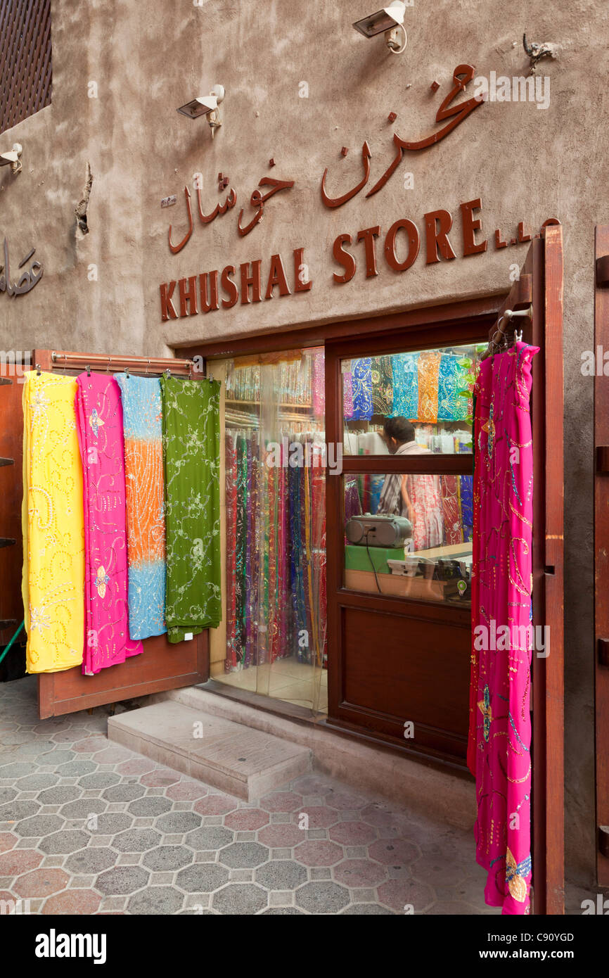 Pahmina scarves or shawls shop in the old Dubai textile souk or Bur Dubai souk Dubai UAE United Arab Emirates Stock Photo