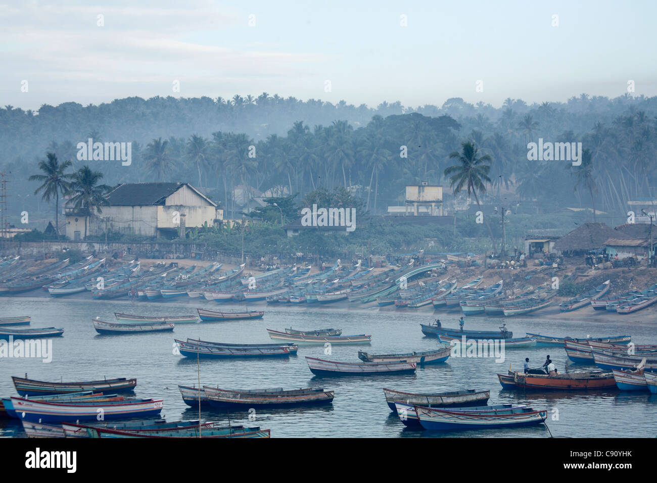 Vizhinjam is a fishing village and historic buildings from colonial history with a large natural port on the coast of Kerala. Stock Photo