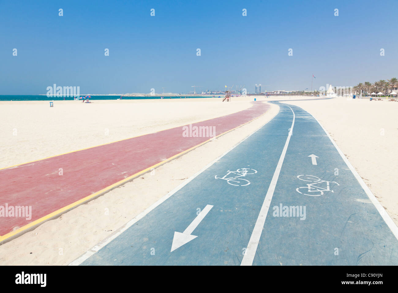 Dubai public beach or Russian Beach or Jumeira Open Beach pathways and cycleways UAE United Arab Emirates Middle East Stock Photo