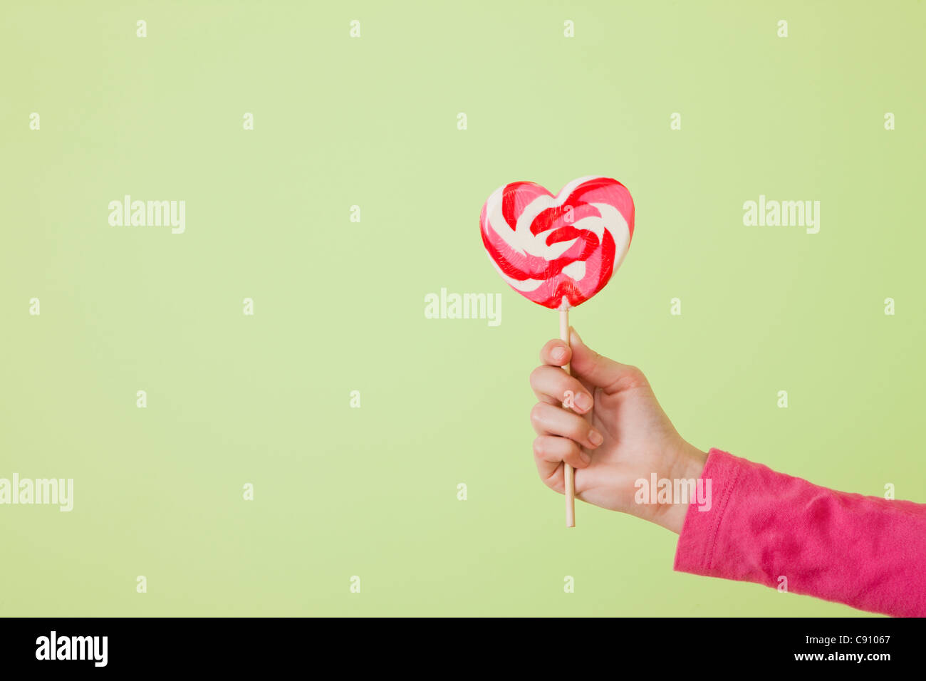 10 to 11 years girl lollipop hi-res stock photography and images - Alamy