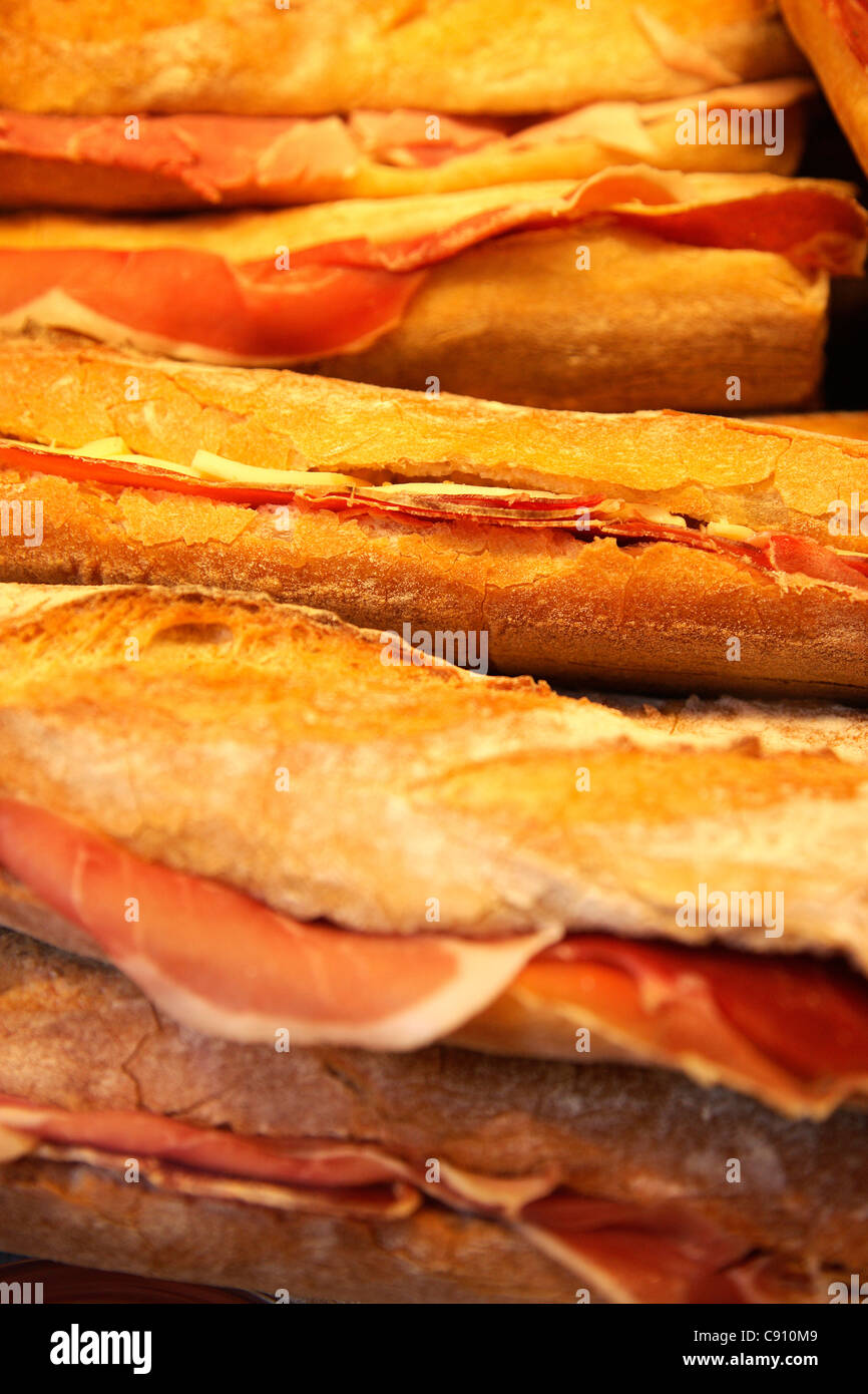 Baguettes with cheese and ham are a traditional French meal very popular at lunch times. Haute Savoie, France. Stock Photo