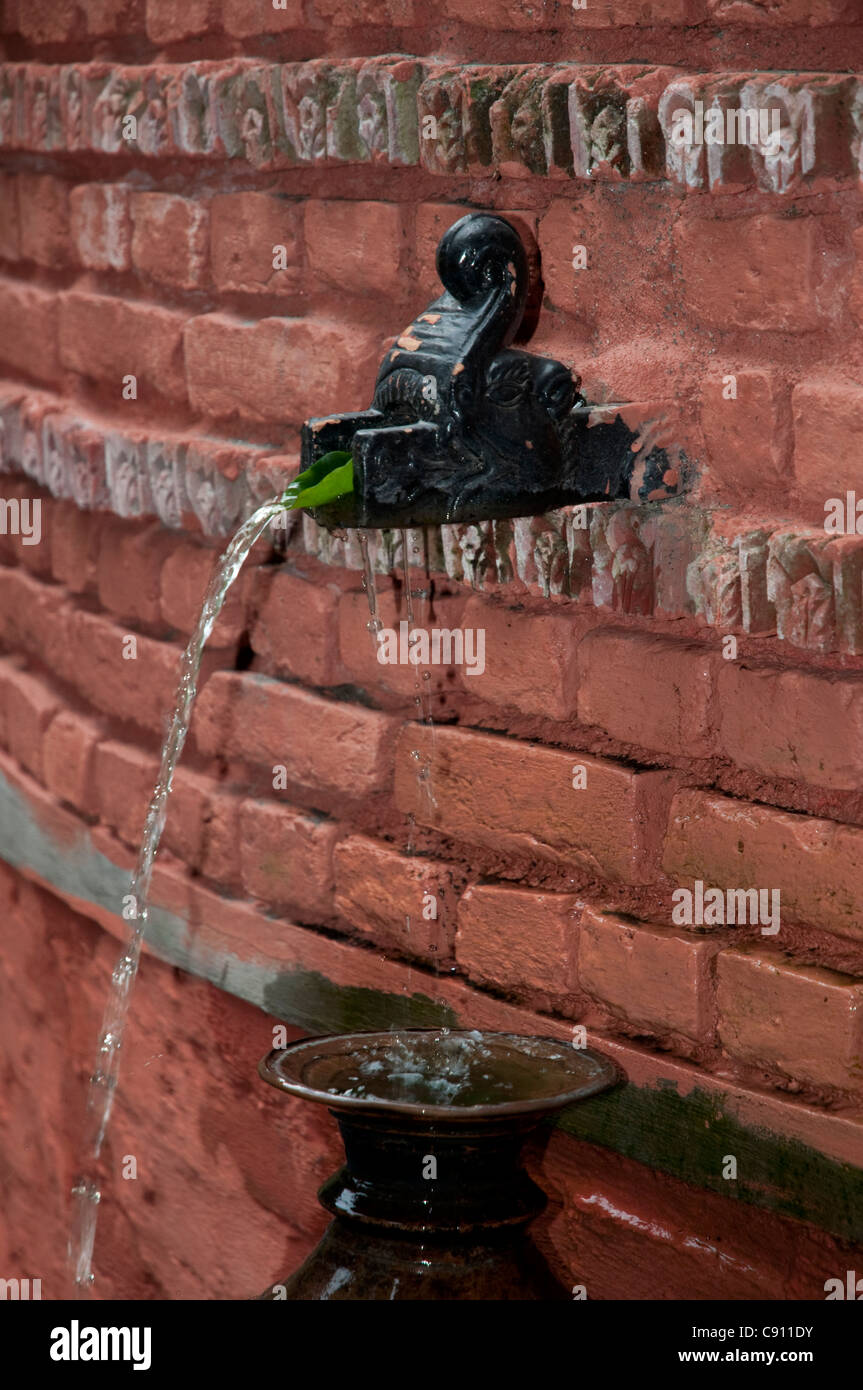 Kathmandu city is the capital of Nepal. There are ornamental water spouts on the streets of the city but the water is not Stock Photo