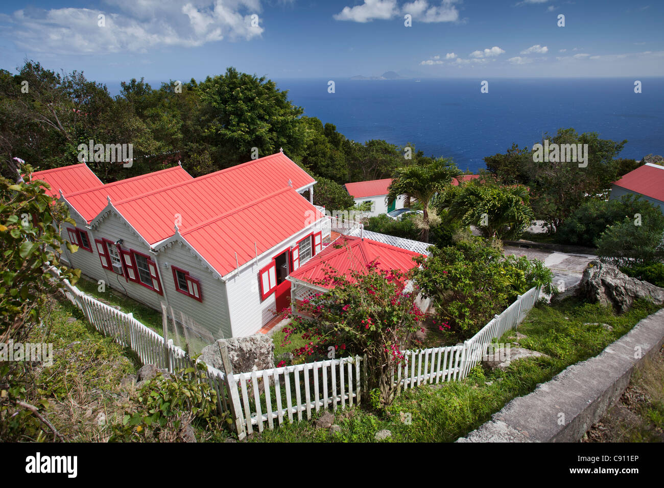 The Netherlands, Windwardside, Saba Island, Dutch Caribbean. Residential house overlooking sea. Stock Photo