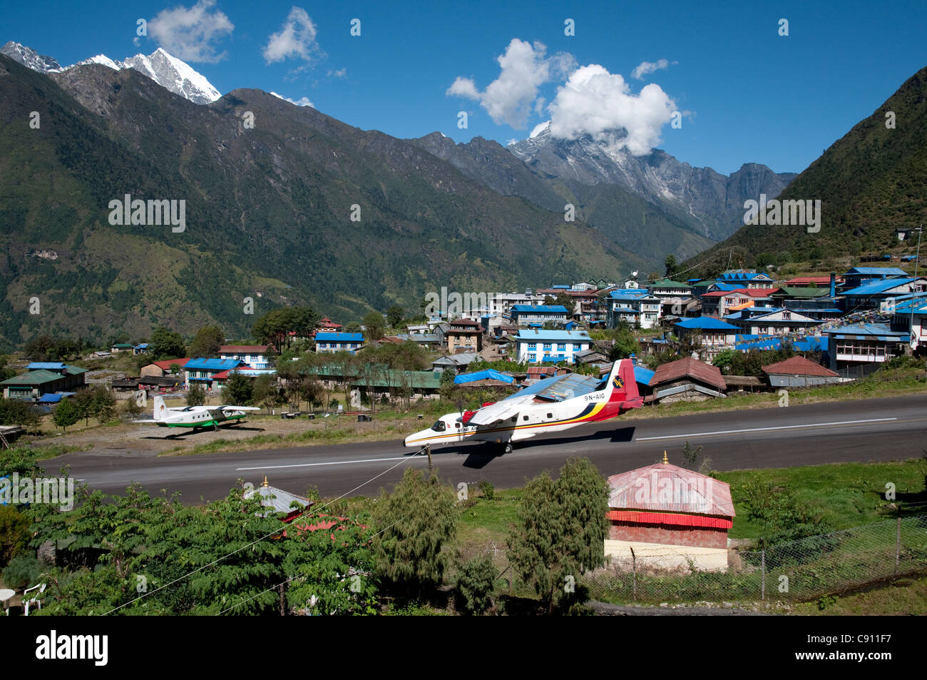 Lukla airfield is the arrival point of many of the trekkers and climbers to the mountain regions of Solu Khumbu. Stock Photo
