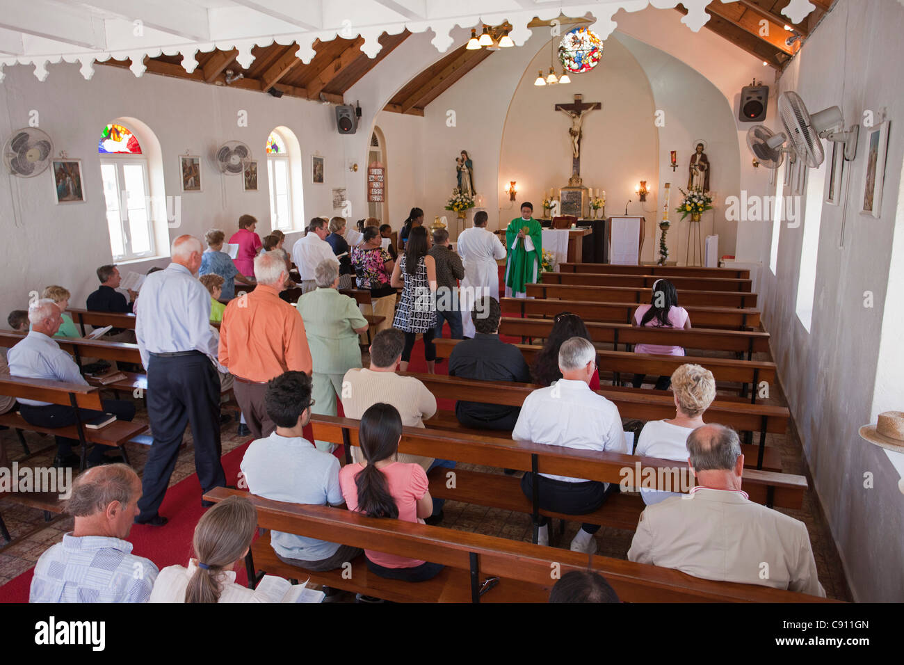 The Netherlands, Windwardside, Saba Island, Dutch Caribbean. Saint Paul's Conversion church, built in 1860. Churchgoers. Stock Photo