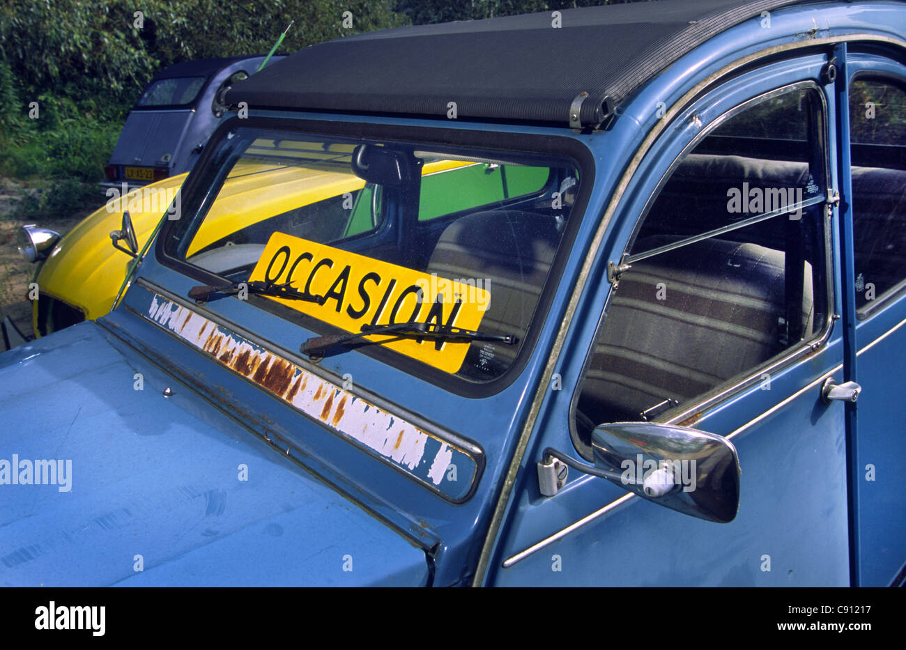 Old Citroën 2CV at used car dealership. Amsterdam, Holland Stock Photo