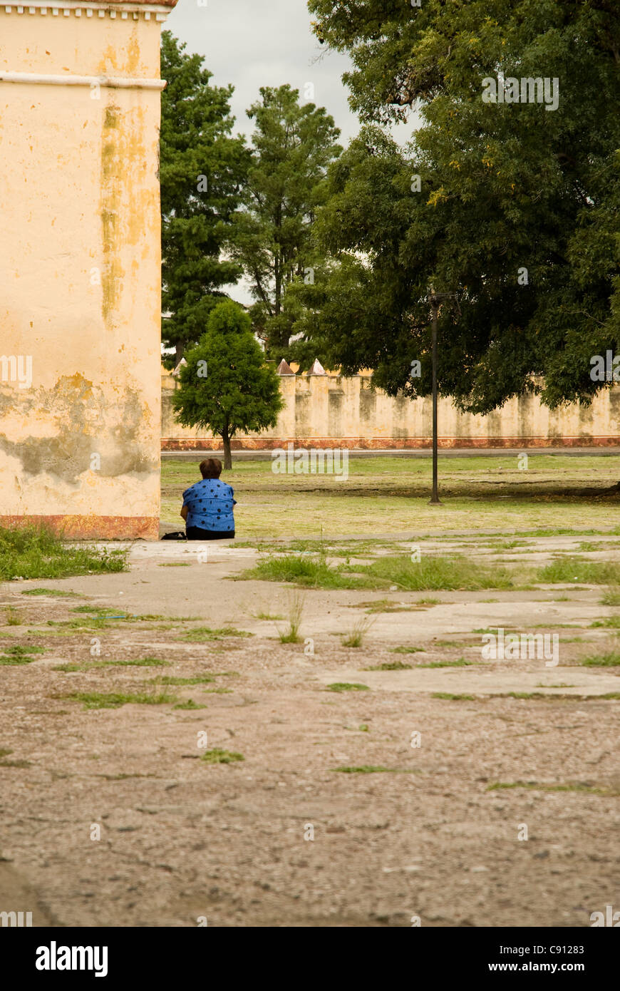Woman sitting alone park hi-res stock photography and images - Alamy