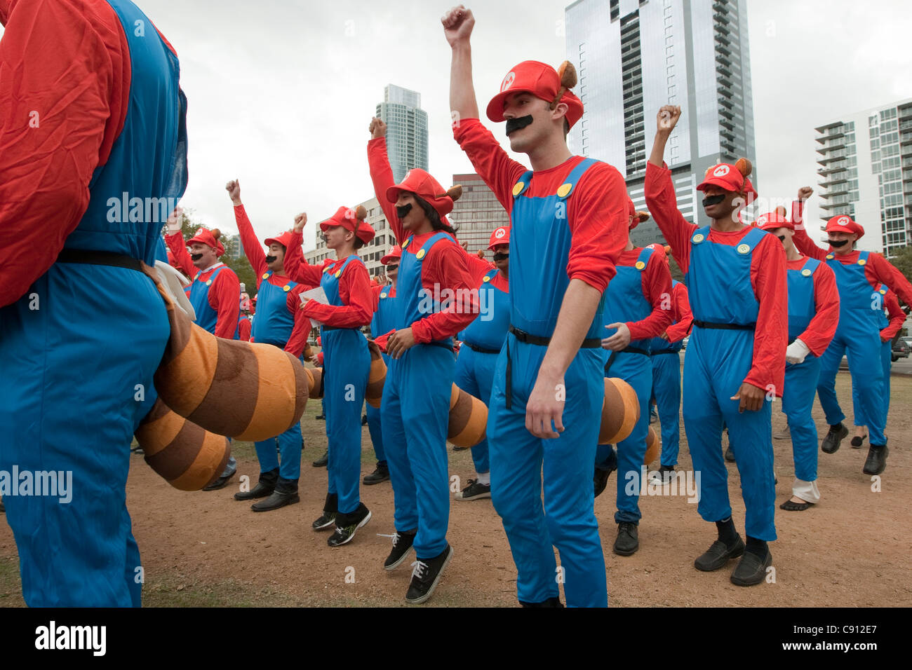 Diverse group of people hired for a flash mob marketing campaign by Nintendo to promote Super Mario 3D Island, a new video game Stock Photo
