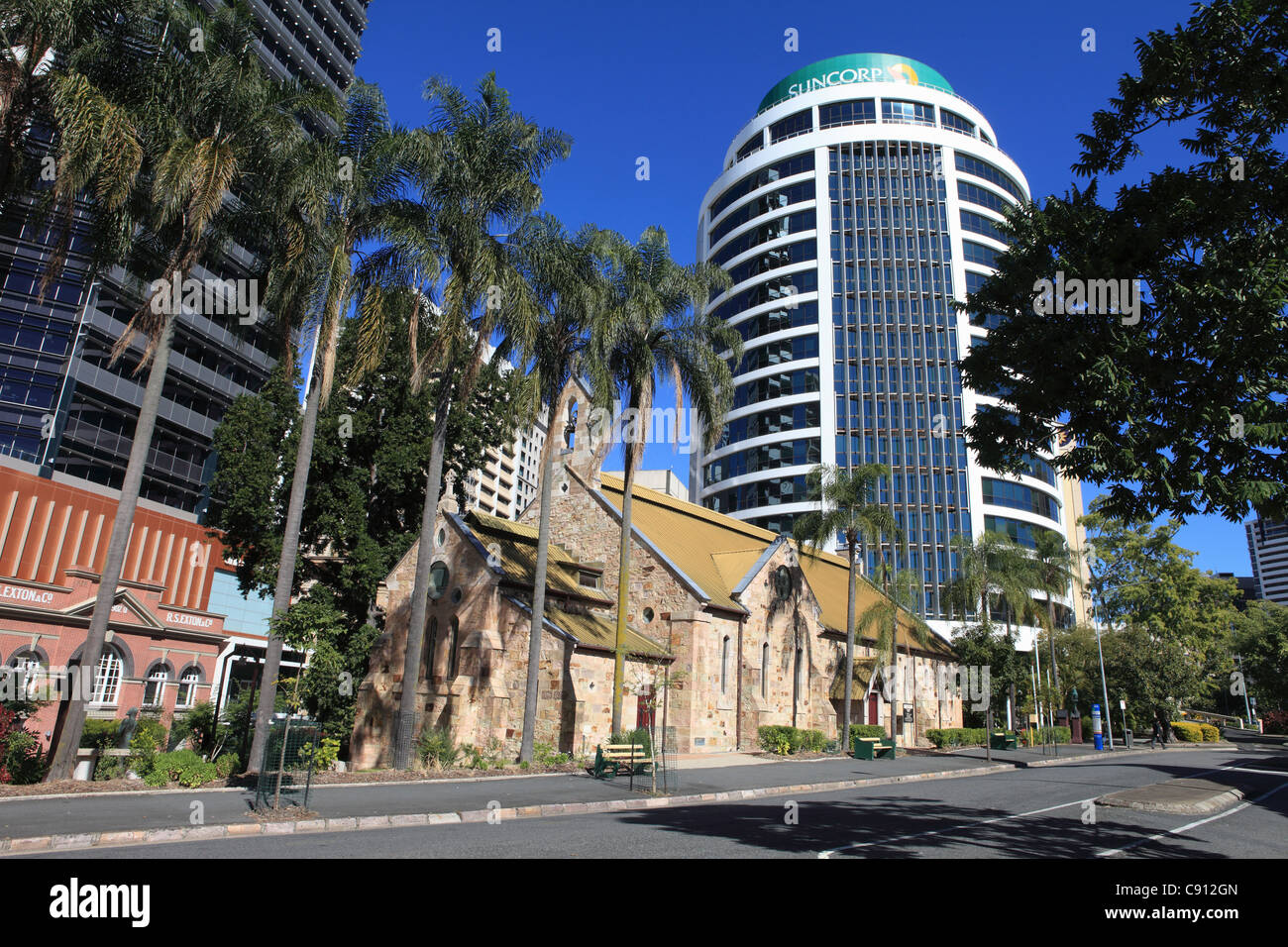 Suncorp Tower in Brisbane is a large landmark surrounded by a mixture of historical and contemporary buildings. Date Shot Stock Photo