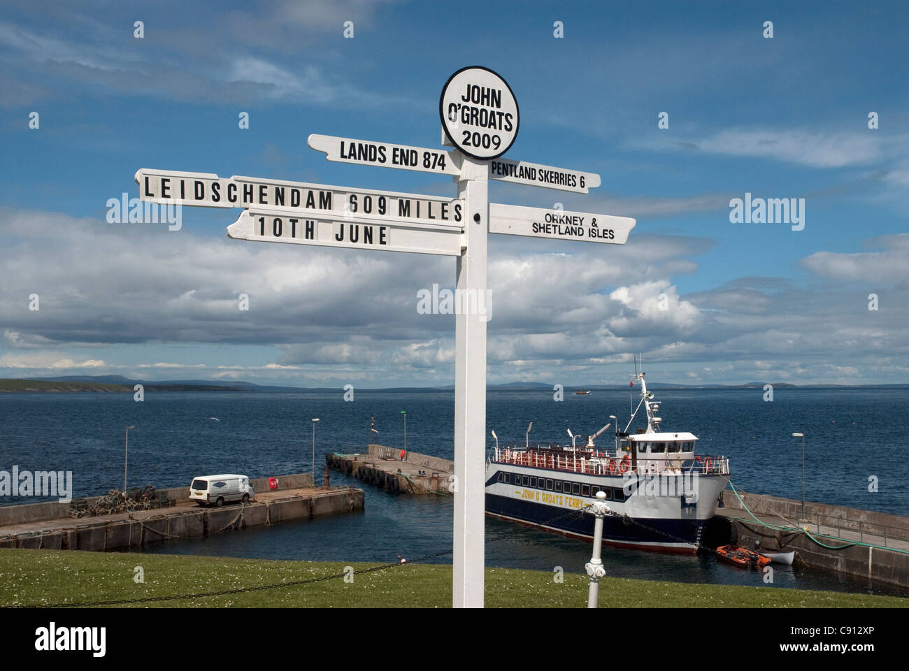 Sign at John O'Groats Scotland pointing the way to Lands End. John O'Groats is the most northern 