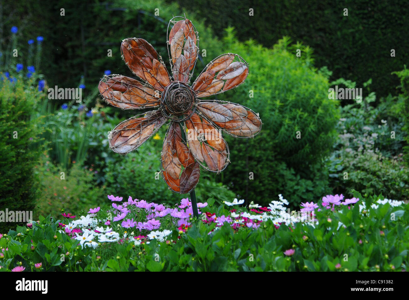 A DAISY SCULPTURE IN THE GARDEN AT THE VYNE NEAR BASINGSTOKE, HANTS
