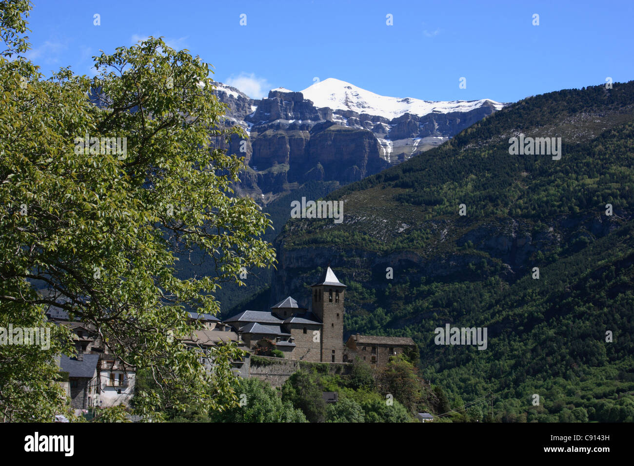 Torla is a village perched on hilltop beneath Mondaruego Mountain which is part of the Huesca Haute Pyrenees range. Torla is a Stock Photo