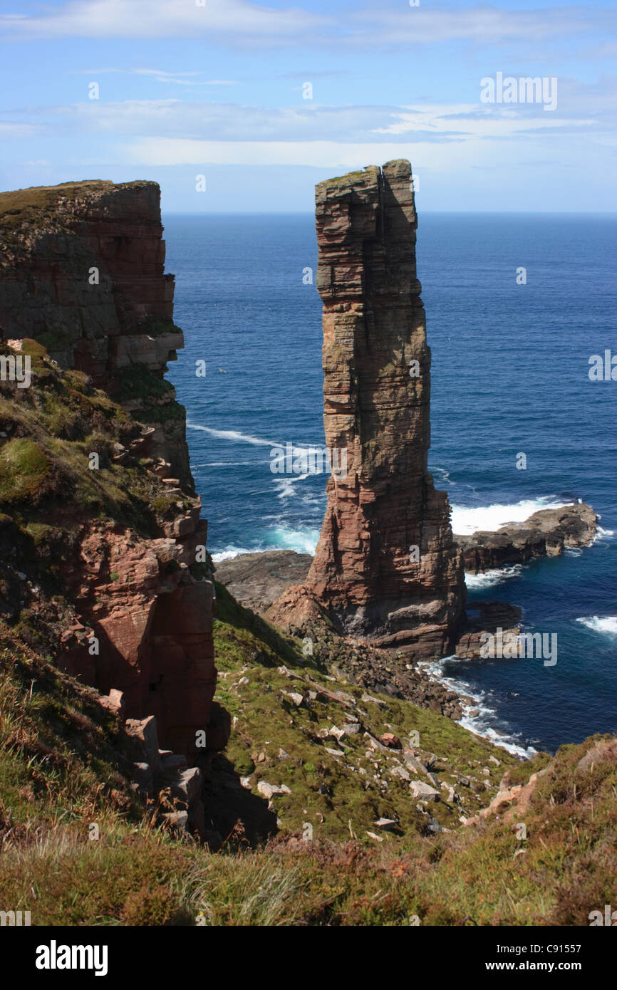 Hoy is the second largest island in Orkney. The Old Man of Hoy is a 450 foot sea stack offshore and is a bird colony and Stock Photo