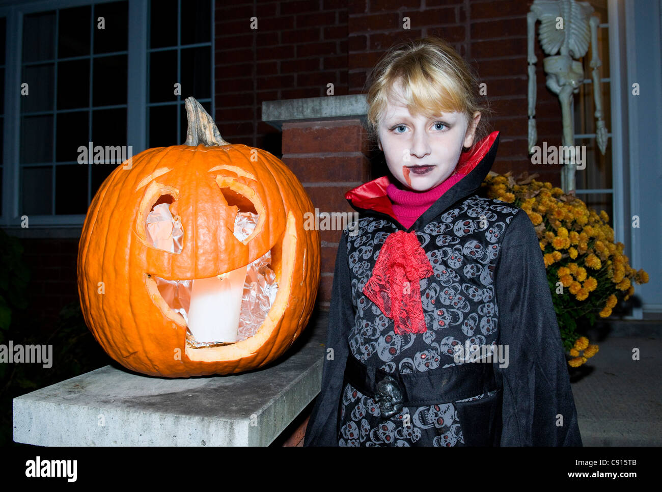 Girl with pumpkin at Halloween time Montreal canada Stock Photo