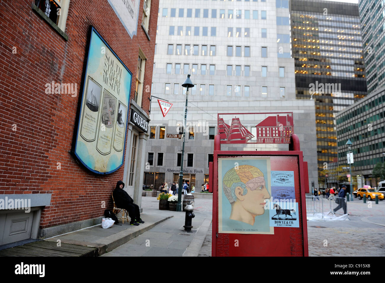 The logo of the South Street Seaport Museum is on a buoy board on Water Street in the Seaport Historic District. Stock Photo