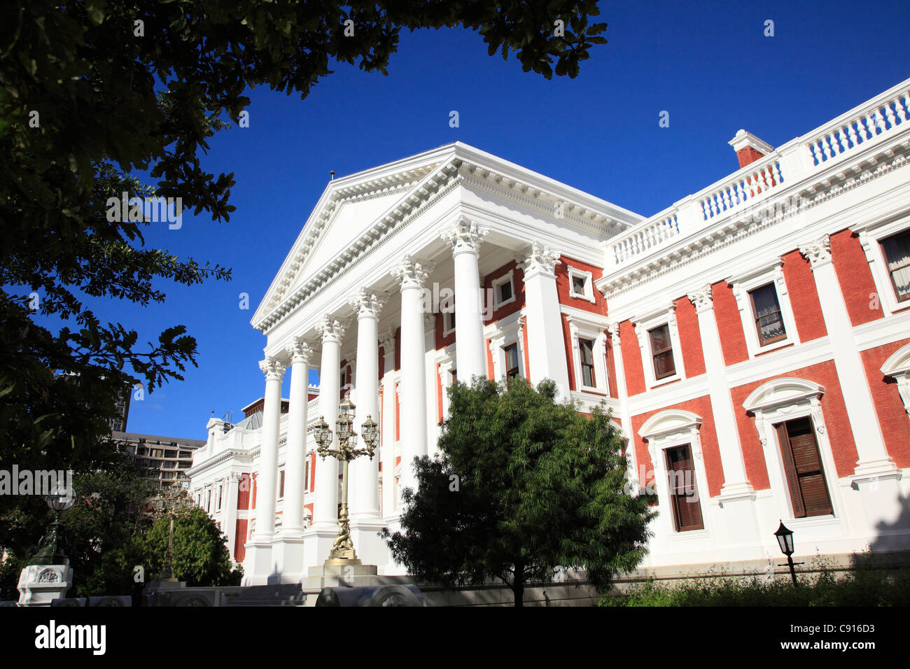 The Parliament building is a neo-classical building in white stone which dates from the 19th century. The Parliament building Stock Photo
